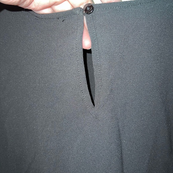 Black top with lace short sleeves. Single button closer at the back. - Picture 4 of 6